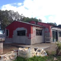 Fachada en etapa de preparación y reparación exterior